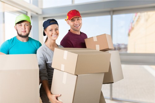 Office relocation planning in Westminster with moving boxes and business equipment