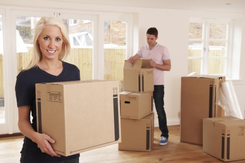 Residential moving team handling furniture in Westminster