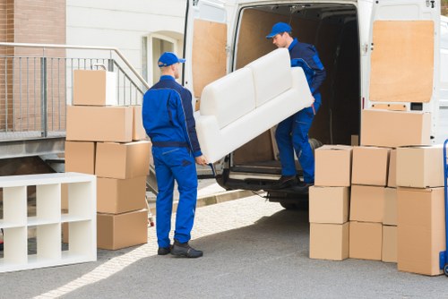Packed boxes and furniture ready for a move in Westminster