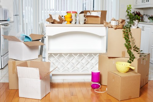 Professional movers loading items for a local Westminster removal service